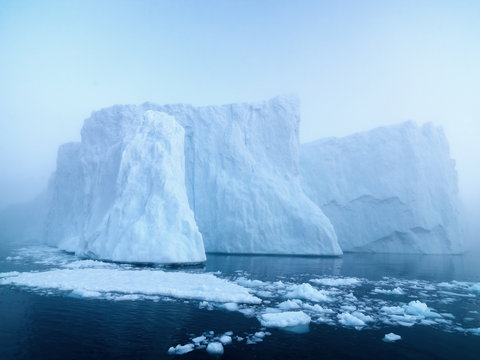 Big icebergs are ont he arctic ocean in Greenland