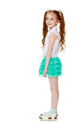 Cute girl with long pigtails