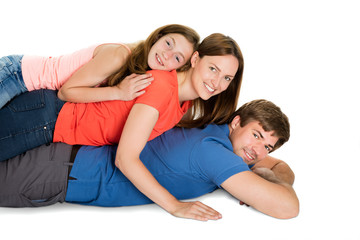 Family Lying On Top Of Each Other