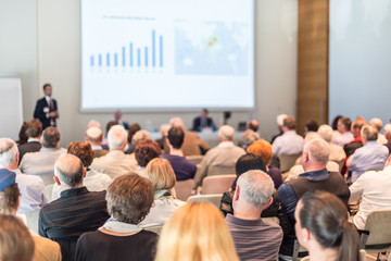 Speaker Giving a Talk at Business Meeting. Audience in the conference hall. Business and...