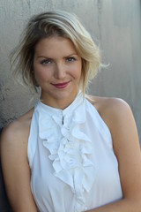 Portrait of beautiful blonde woman smiling