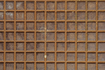 Metal texture of manhole cover with squares
