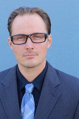 Head shot of businessman wearing glasses 