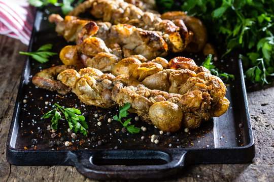 Roasted chunchules. Typical Latin American Chilean and argentina food.
