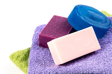 natural soap bar on bath towel