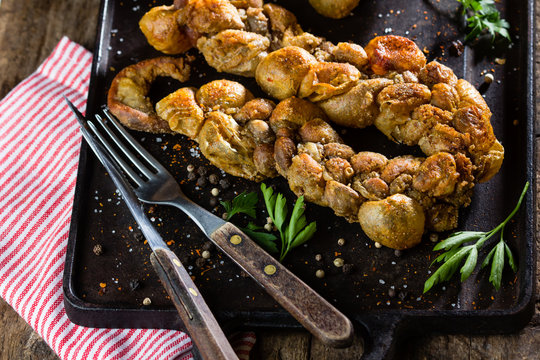 Roasted chunchules. Typical Latin American Chilean and argentine food.