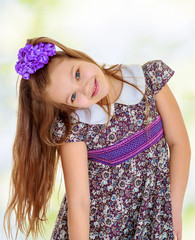 Beautiful little girl with long hair