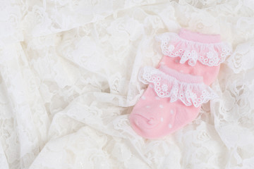 Obraz na płótnie Canvas Pink baby socks for new born baby