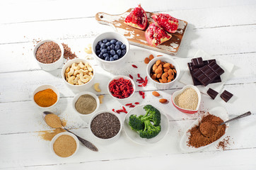Super foods on white wooden board.  Healthy food.