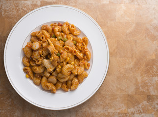 Baked macaroni, chicken, and tomato sauce