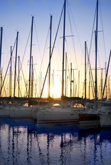 boats in the Rome harbour at the sunset