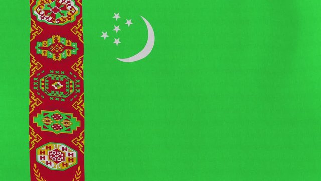 Loopable: Flag of Turkmenistan...Turkmen official flag gently waving in the wind. Highly detailed fabric texture for 4K resolution. 15 seconds loop.
