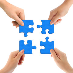 Hands and puzzle