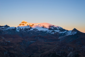 Sunset light over the scenics Monte Rosa glaciers and the Klein Matterhorn or Piccolo Cervino summit (3881 m), italian side, Valle d'Aosta.