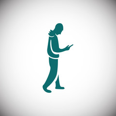 Fototapeta na wymiar man goes with the phone in hand icon vector flat design