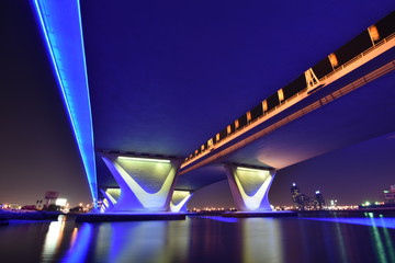 Fototapeta premium Garhoud Bridge from base at night with long exposure, Dubai, UAE