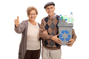 Man holding recycling bin and woman giving thumb up