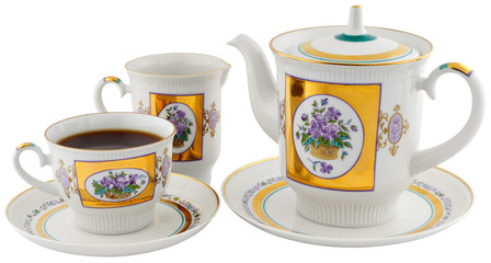 Tea cup, teapot andcream-jug