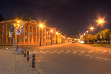 Night view of illuminated Lieutenant Schmidt Embankment in Saint Petersburg, Russia.