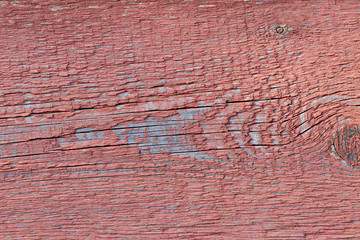 Red painted wood planks as background or texture. Close-up