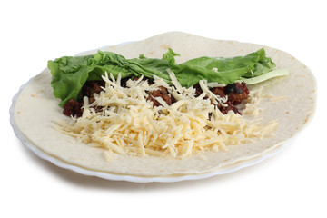 Burrito and ingredients on a white background