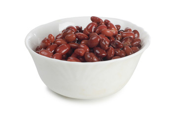 Red beans in a dish on a white background