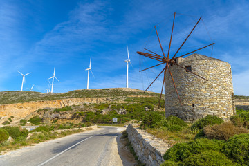 Old traditional windmill in Naxos countryside, Cyclades, Greece. - obrazy, fototapety, plakaty