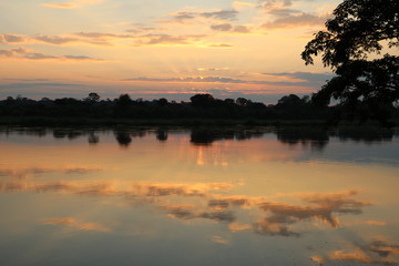 Sun is going under at the Caprivi Strip of Namibia, Africa 