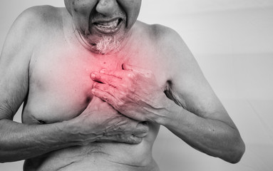acute pain possible heart attack, senior man is clutching he che