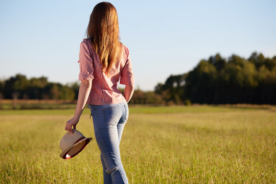 Young Happy Woman In Green Field