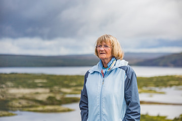 Senior woman at Thingvellir National Park - Iceland