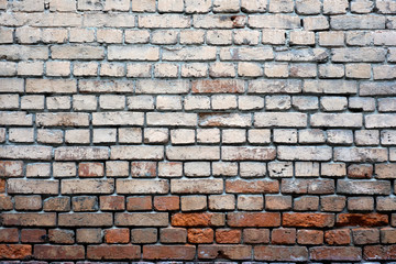 Obraz premium Old brick wall as background horizontal view closeup