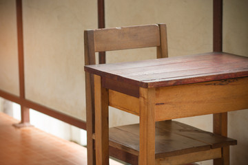 Chair in empty classroom with hand write, lecture armchairs in s