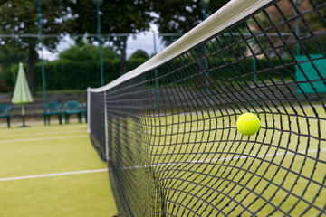 Tennis ball in net