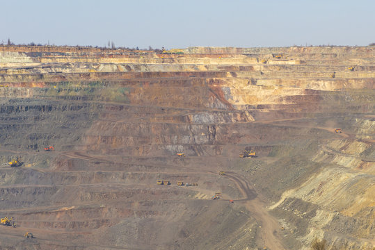 Aerial view of open pit mining of iron ore.