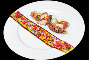 Beautifully decorated boiled and fried octopus plate