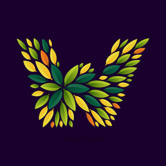 W letter logo formed by green and autumn leaves.