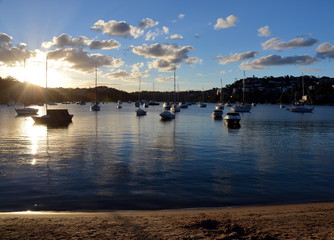 Fototapeta premium Yachts parking in the harbour in sunset