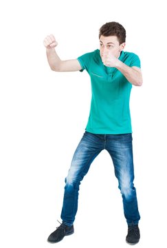 skinny guy funny fights waving his arms and legs. Isolated over white background. Funny guy clumsily boxing. A young boy learns to box.