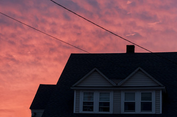 sunset creates an orange tone to the houses
