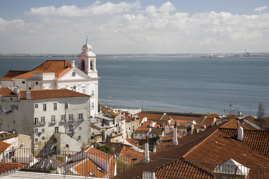 View of Lisbon from Santa Luzia viewpoint, with Santo Estevao church on the left.