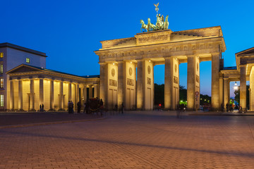 Obraz premium Brandenburg gate illuminated in Berlin, Germany