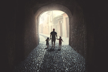 Father walking with children