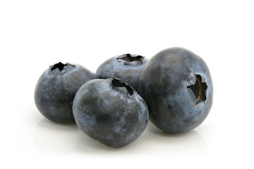 Group of fresh blueberries on white