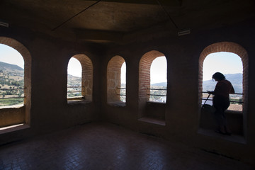 A visitor in the kasbah tower, Chefchaouen, Morocco