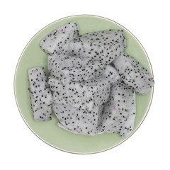 Dragon fruit in saucer isolated on white background.