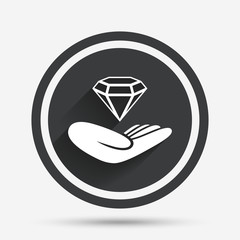 Jewelry insurance sign. Hand holds diamond.