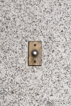 old bell outside door of an old house

