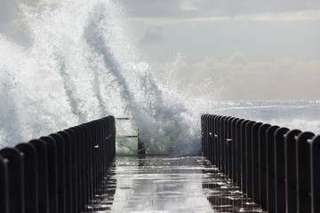 Beach Pier Waves ocean storm swells crashing water power