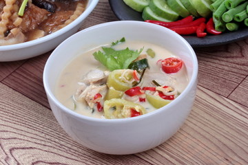 Close up of coconut milk and fermented soy bean sauce call 